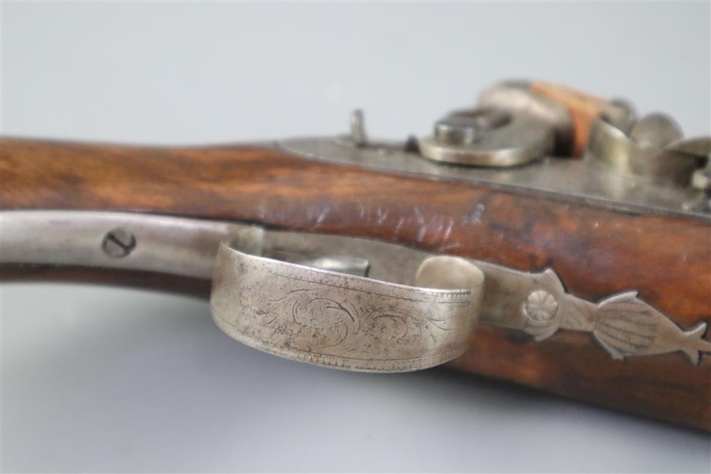 An early 19th century flintlock holster pistol, signed Prosser, length 15in.